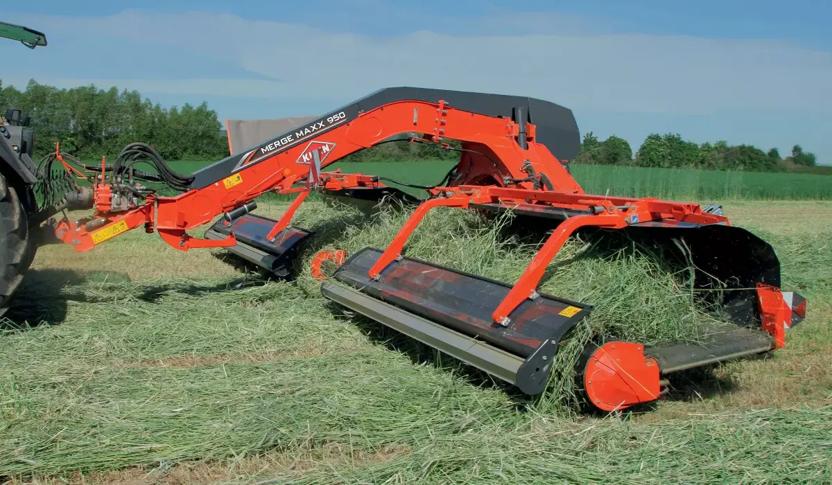 MM 950 & 1090 Center-Delivery Twin Merger s attached to tractor rear, in field