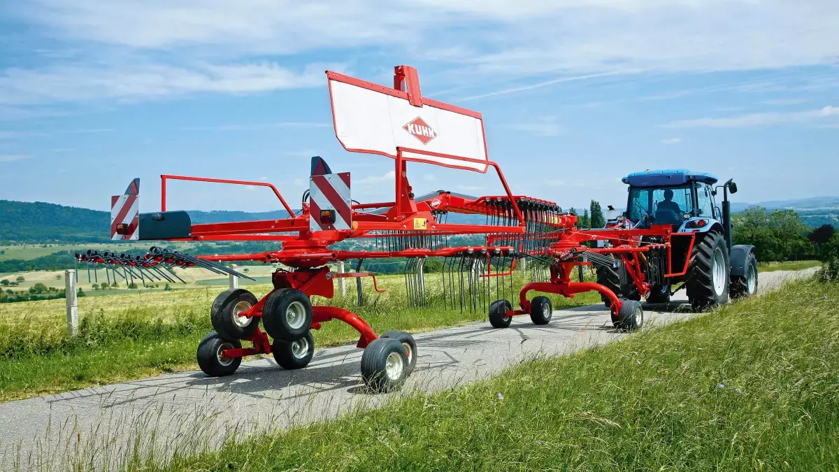 GA 6632 / 7932 / 9032 Twin-Rotor Rotary Rake attached to tractor rear, in transport