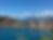 bay of sestri levante italy from hillside with boats and beachgoers