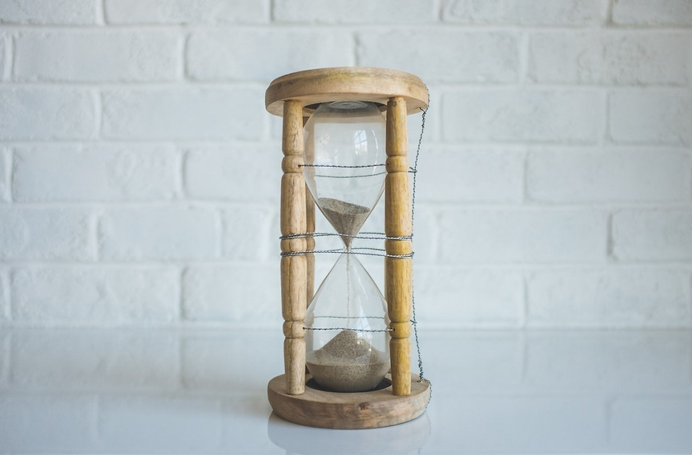 Picture of an hourglass on a table