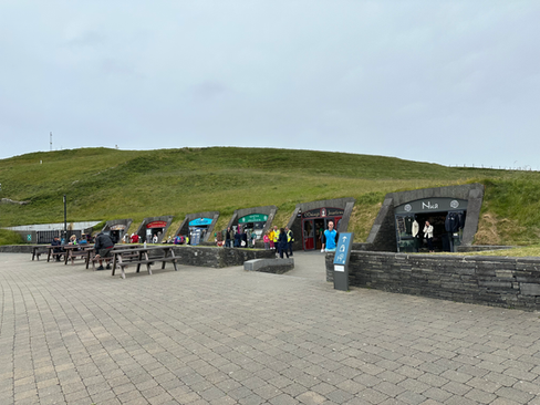 tourist shops built underground in hillside at cliffs of moher north viewpoint ireland
