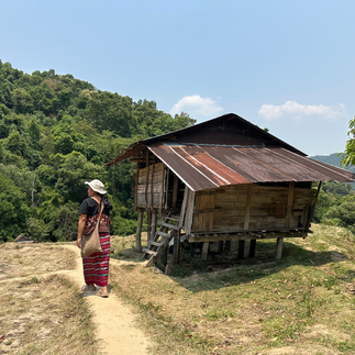 karen tribe member and tour guide in mae klang luang rice terrace thailand