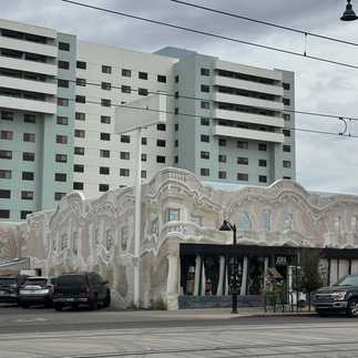 2012 mural of melting building by R.E. Wall and Margaret Dewar