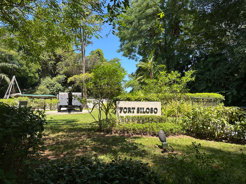 fort siloso sign and cannon on western edge of sentosa island singapore