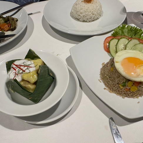 four plates on white table