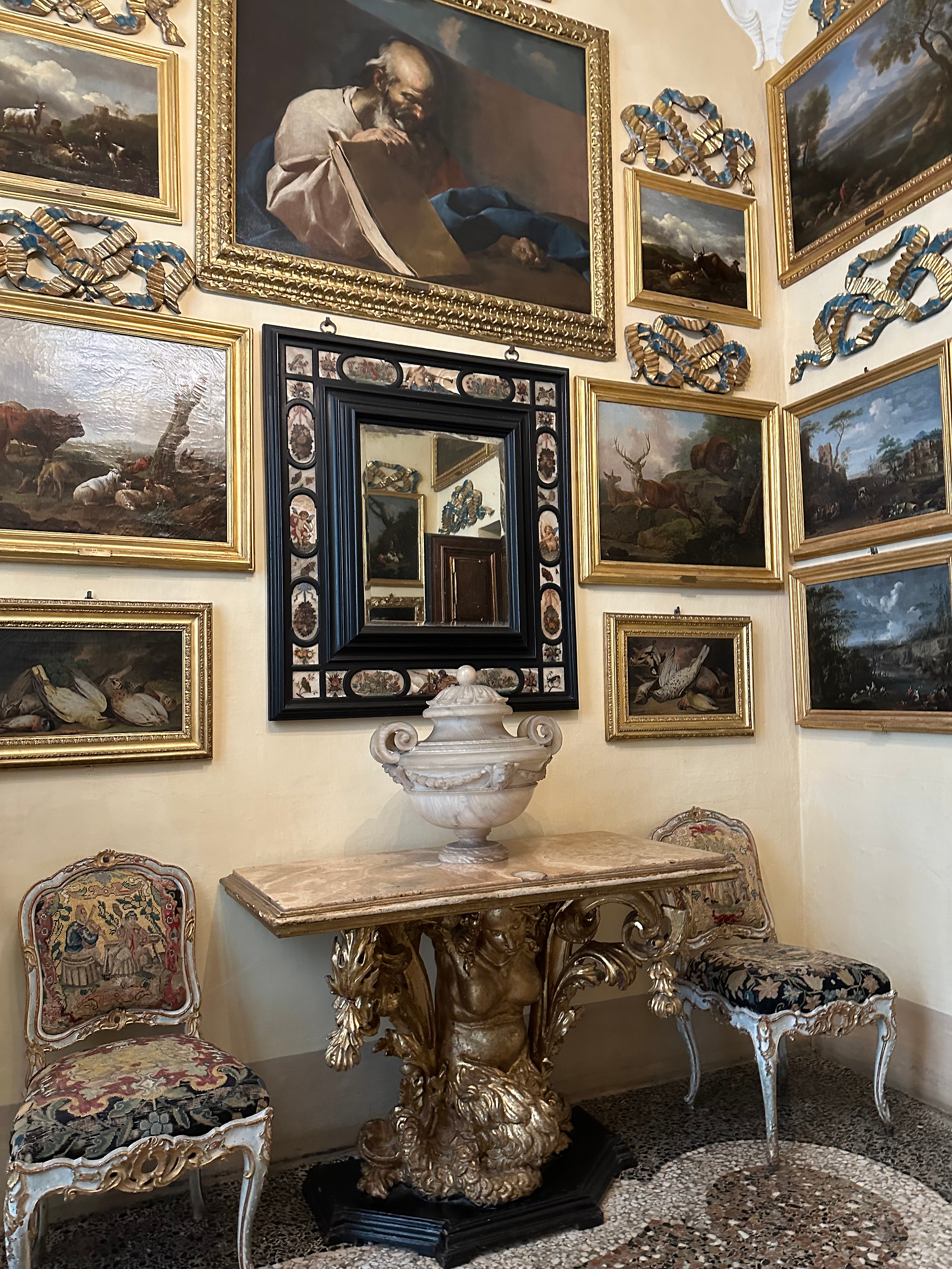 view inside isola bella palace art frames and side table in stresa italy