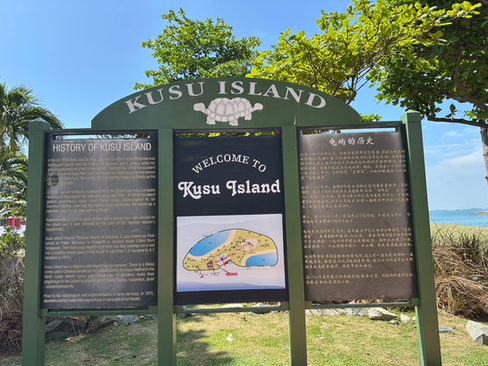 signpost and map of kusu island singapore