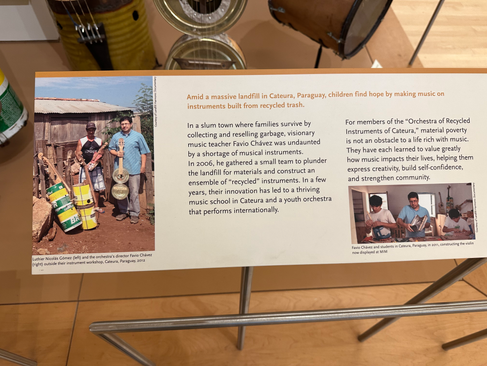 placard at the exhibit of the recycled orchestra at the musical instrument museum phoenix