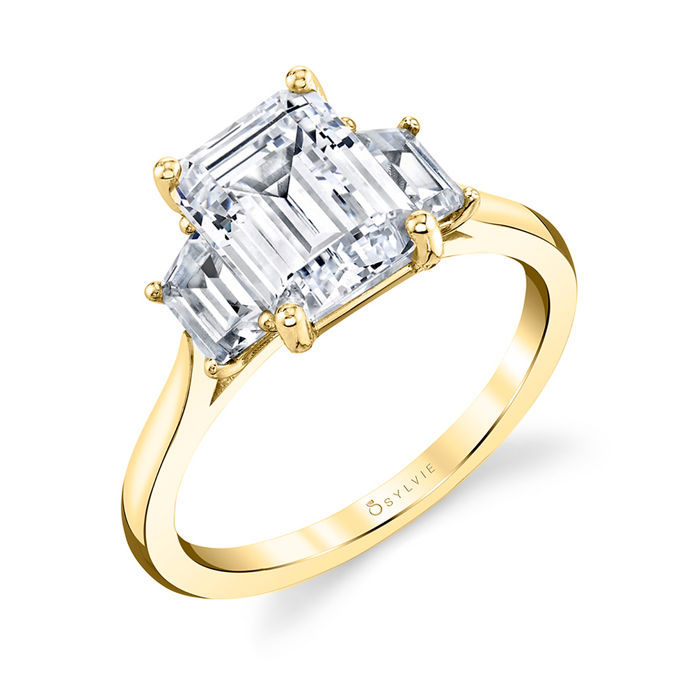 Thumbnail: Three Stone Emerald Engagement Ring With Trapezoid Side Stones | Annalise