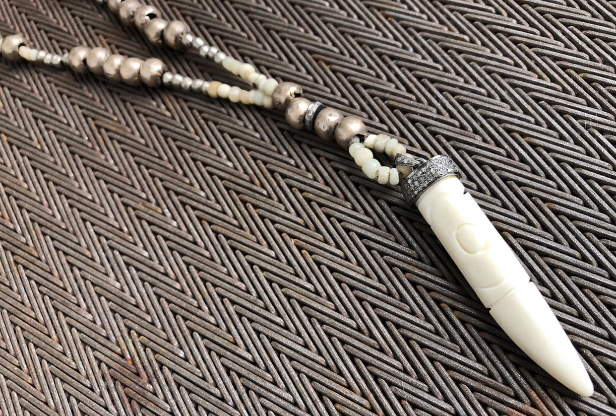 Spear bone silver & diamond necklace