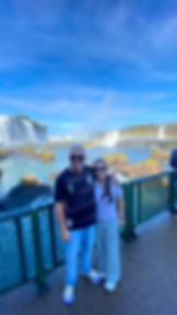 Couple posing in front of Iguazu Falls on a private tour, Brazilian side