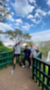 Couple with a licensed WS TOURS guide in front of Iguazu Falls on a private tour