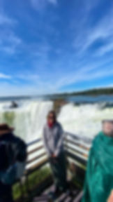 Woman traveling solo enjoying the viewpoint at Iguazu Falls, Argentine side