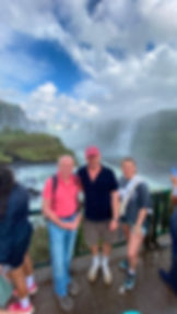 Father with his children in front of Iguazu Falls on a private family tour