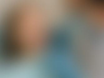 Image of a dentist examining a patient's teeth