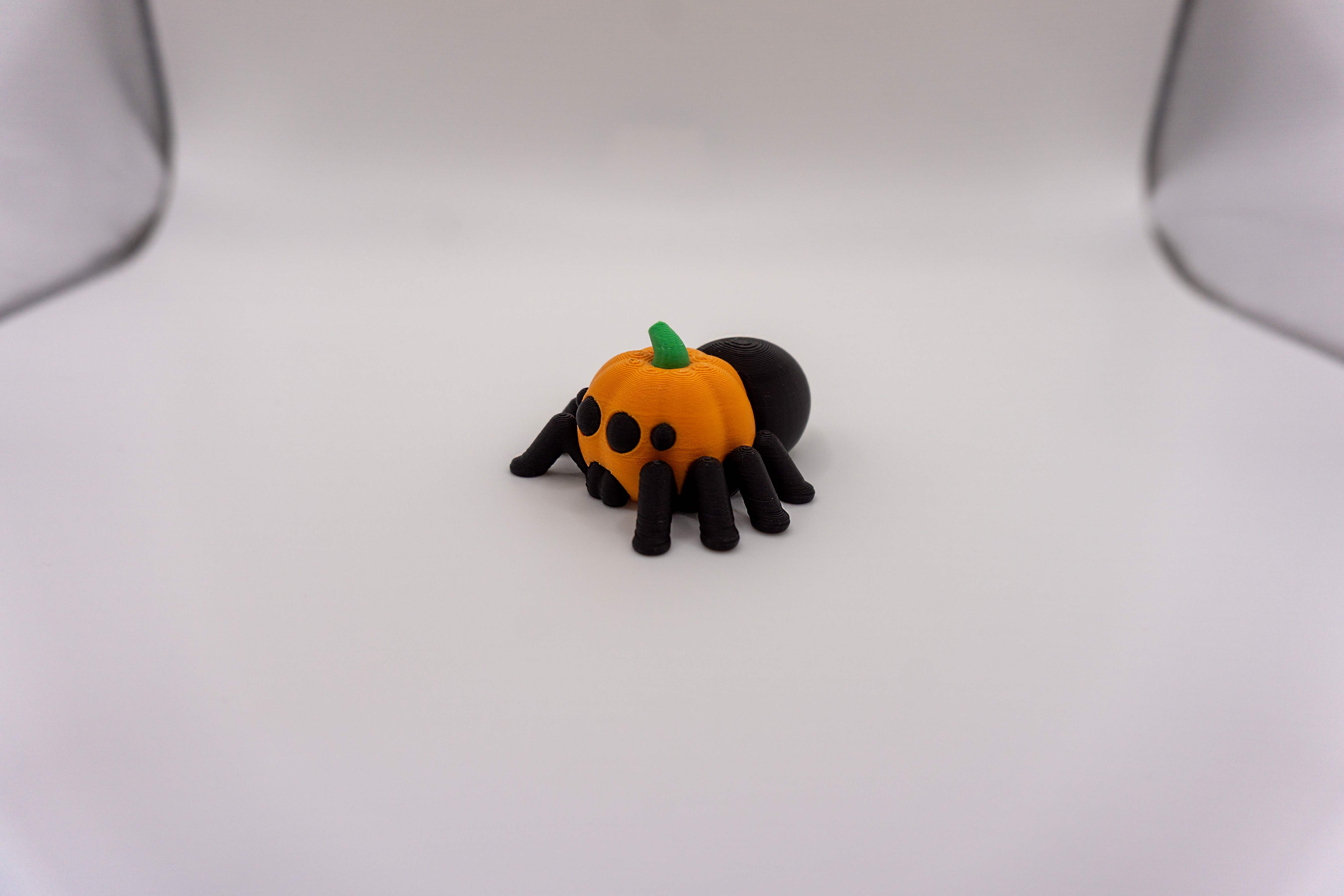 Flexi Pumpkin-Head Spider Keychain - front angled view