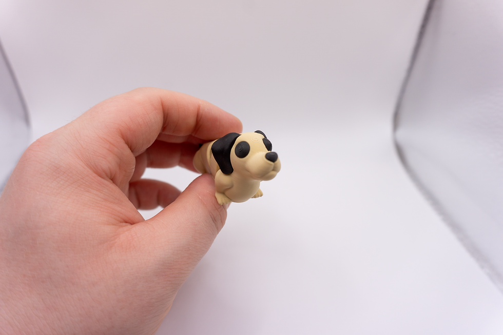 Thumbnail: Flexi Dachshund Keychain - held in hand