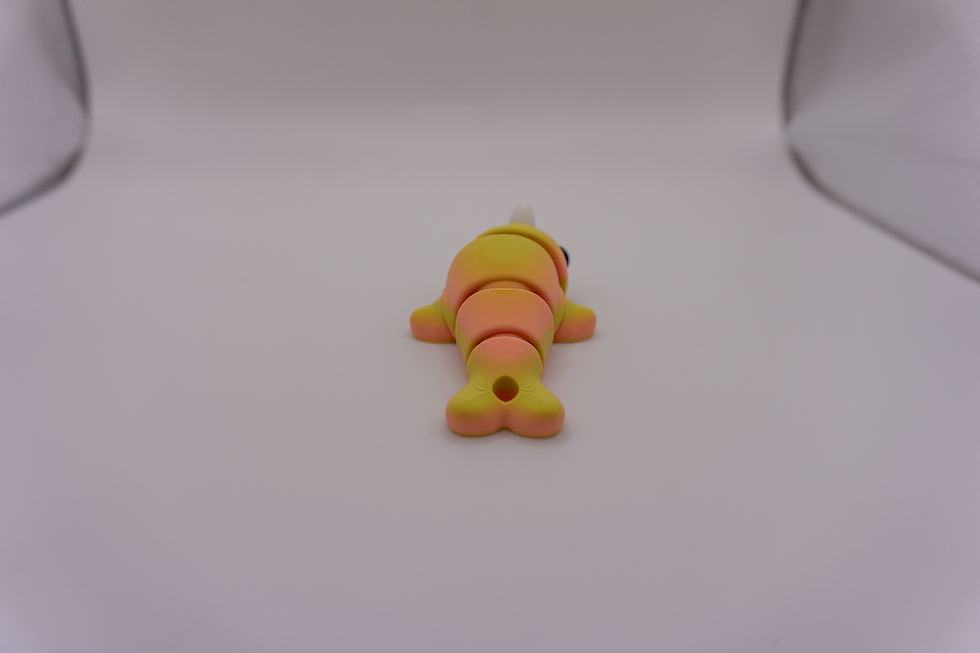 Thumbnail: Flexi Colourful Narwhal Keychain - back view