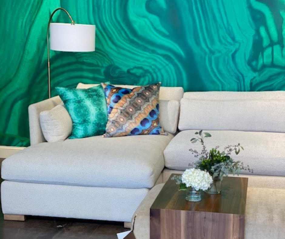 Modern living room featuring houseplants and dark greens