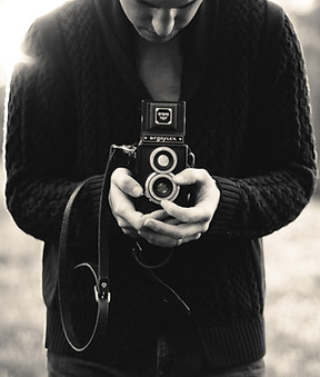Person Holding Camera