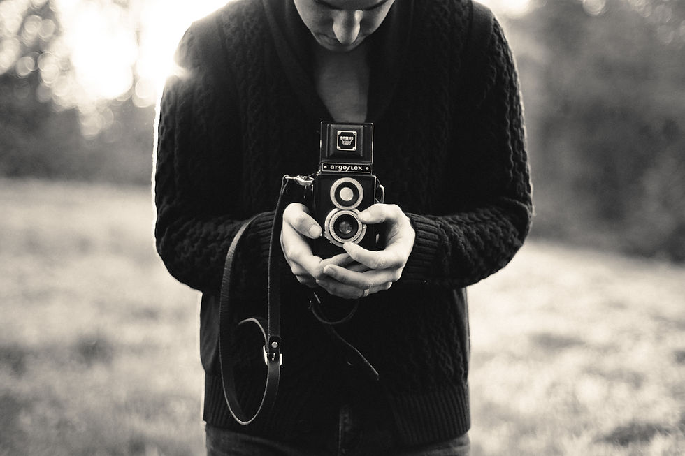 Person Holding Camera