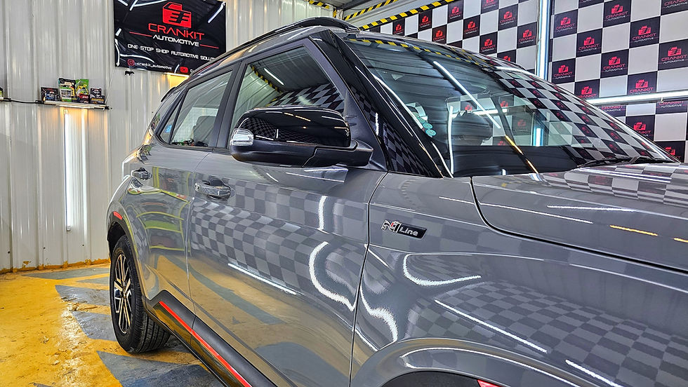 Kia Sonet receiving premium Paint Protection Film (PPF) installation at Crankit Automotive in Pune, featuring gloss finish TPU film applied in a professional dust-free studio for maximum paint protection.