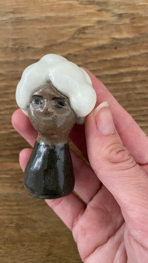 glazed miniature sculpture of female head