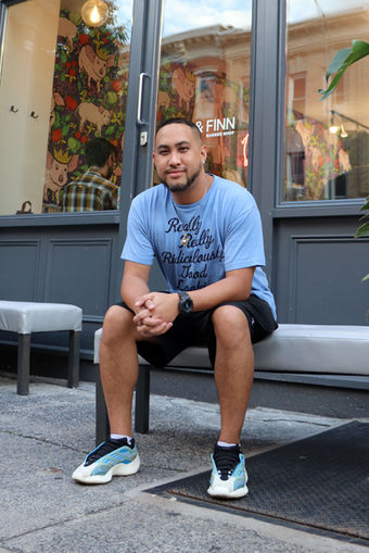 John Reyes Master Barber at Otis and Finn Barbershop Williamsburg location