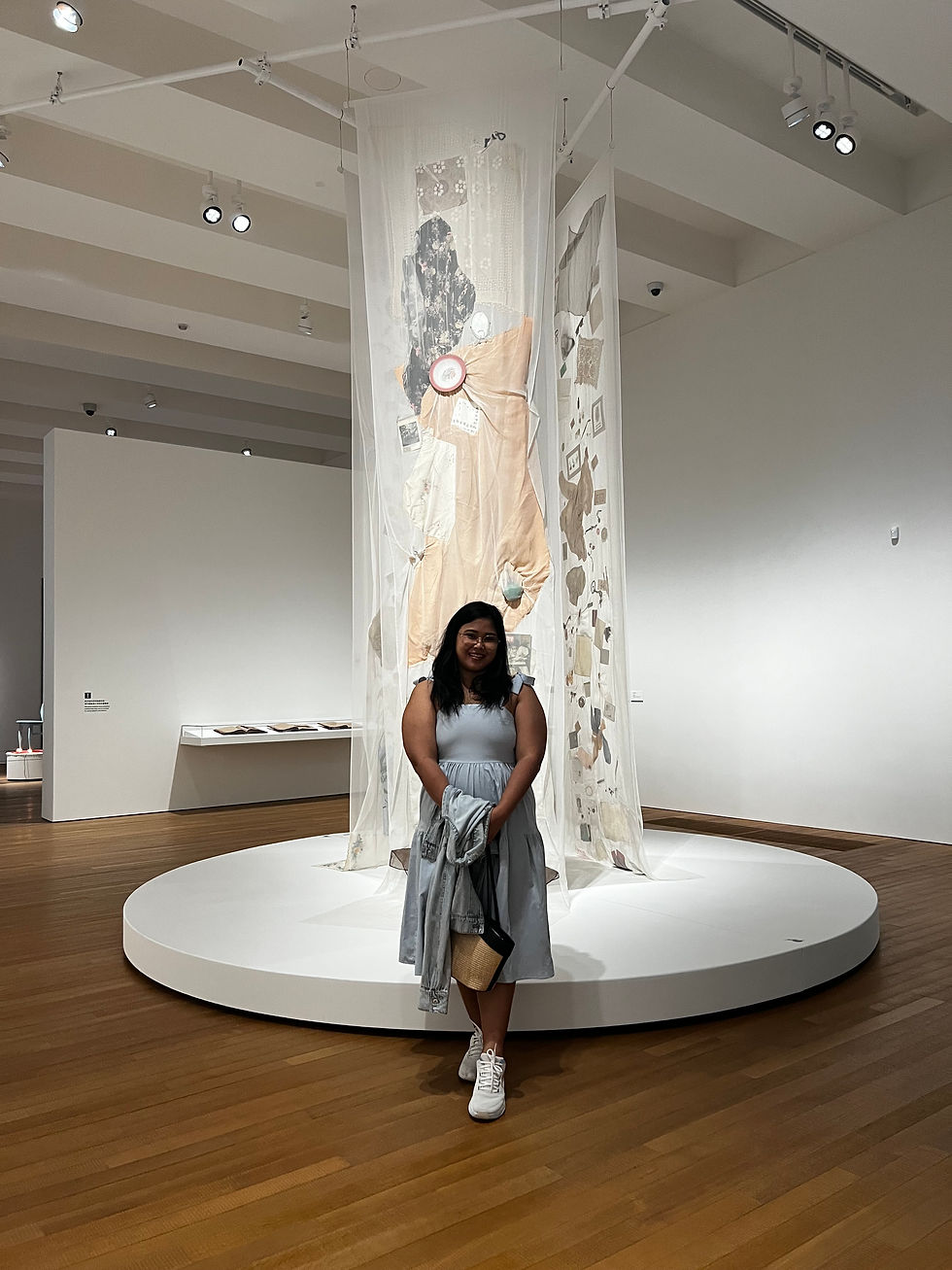 Me posing in front of Hu Xiaoyuan’s In the Times, exhibited at M+