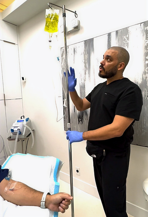 Doctor monitoring the IV Infusion during In-Office IV Infusion and Phlebotomy course