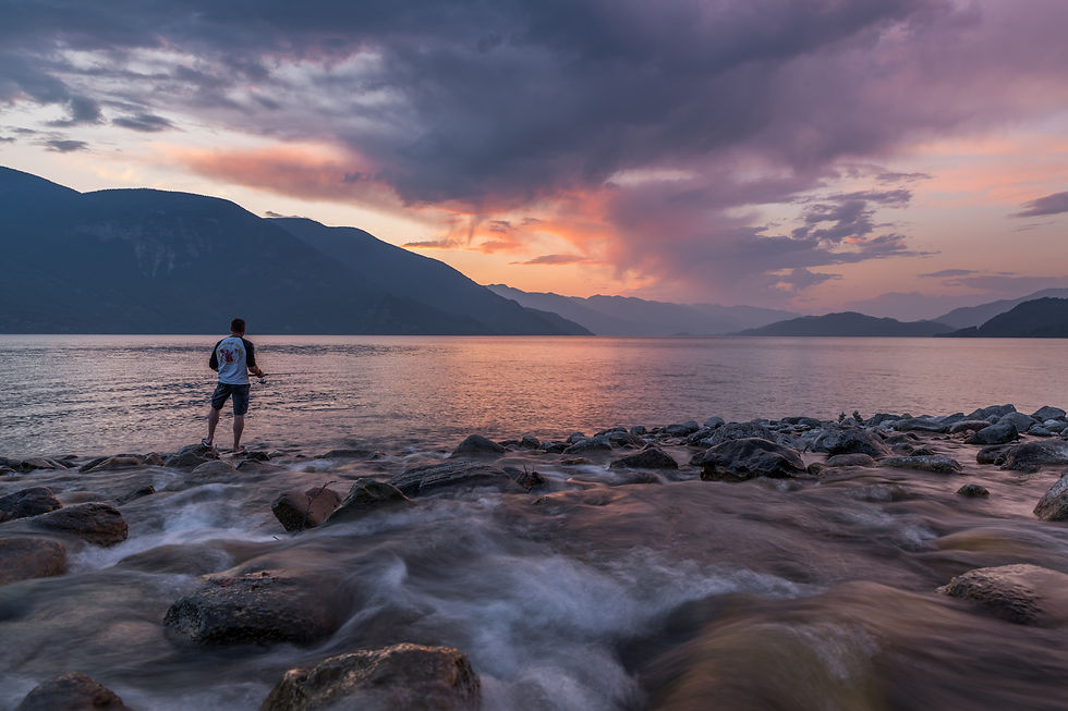 Shoreline fishing at the mouth of a creek on Kootenay Lake