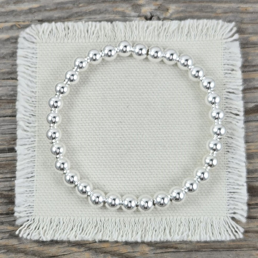 Thumbnail: plain 6mm beaded silver stretchy bracelet