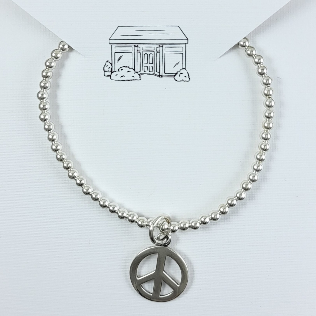 peace charm & 3mm beaded stretchy bracelet
