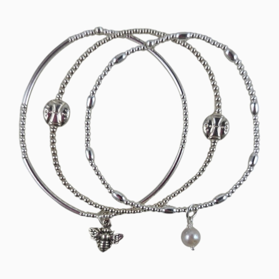 sterling silver stretch bracelet trio with bee & pearl dangle | www.elizaperry.com