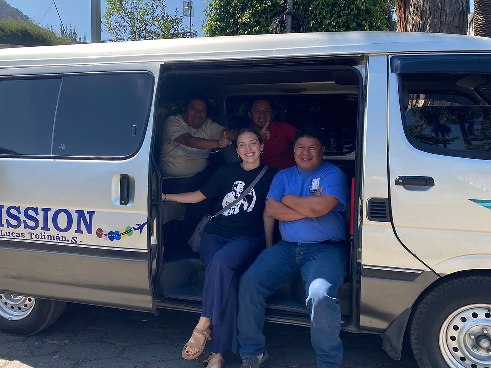 Myself and the beloved Mission drivers: Rich (with devil horns above my head), Nelson, and Edgar