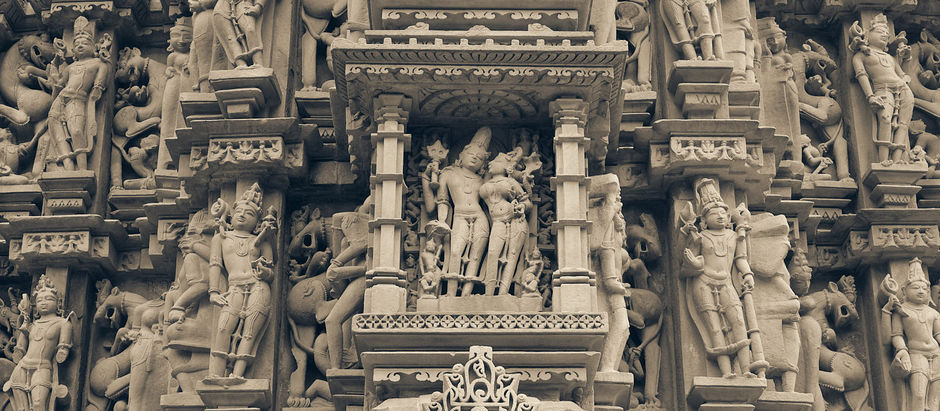 Sculptures in Khajuraho on side walls