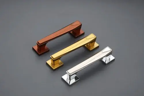 An eye-level view of a stylish stainless steel pull handle on a door