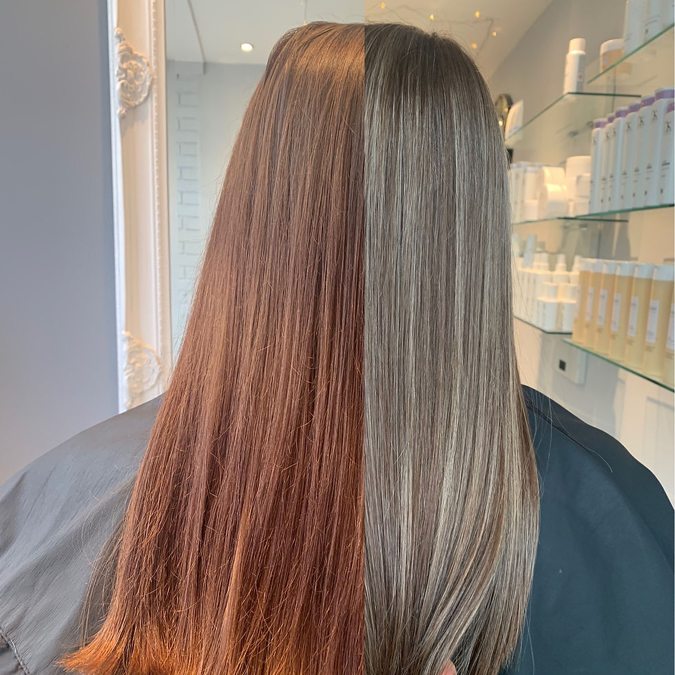 Portrait of a client with vibrant, evenly toned hair colour after a professional colour correction at Hair By Marta