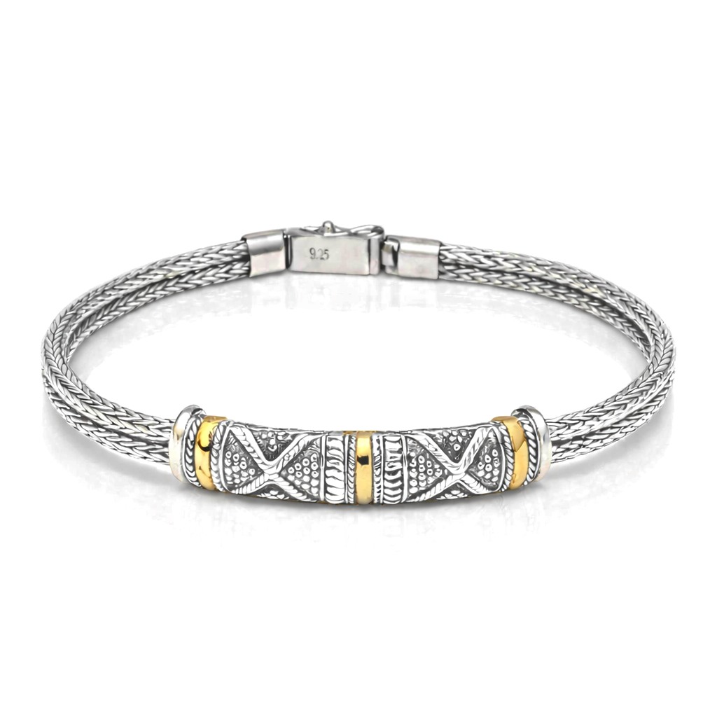 Silver bracelet with gold inserts