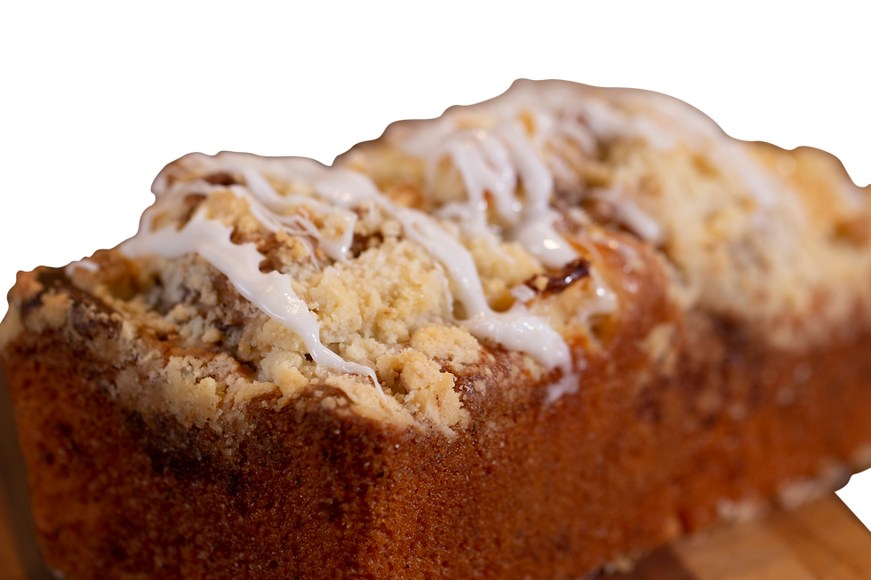 Thumbnail: Close-up of delicious loaf cake with icing and crumble topping.