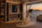 Luxury superyacht interior featuring the BMYGYM Orvea fitness wall and Aurelia bike.