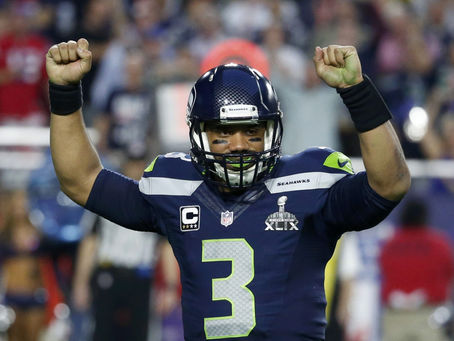 [Video] Seahawks QB Russell Wilson Surprise Teammates with X-Mas Gifts
