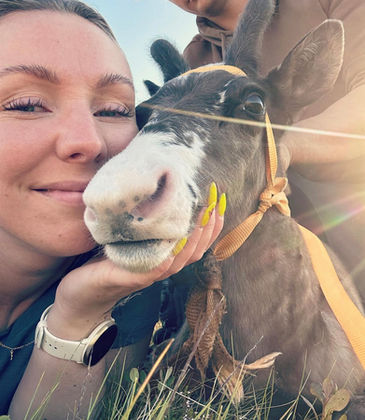 Maria with a reindeer calf baby on the Hammerfest tundra