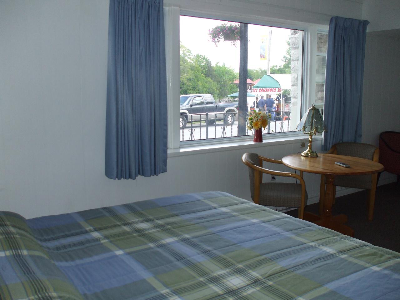 Room 1. King Bed, Outdoor Seating.
