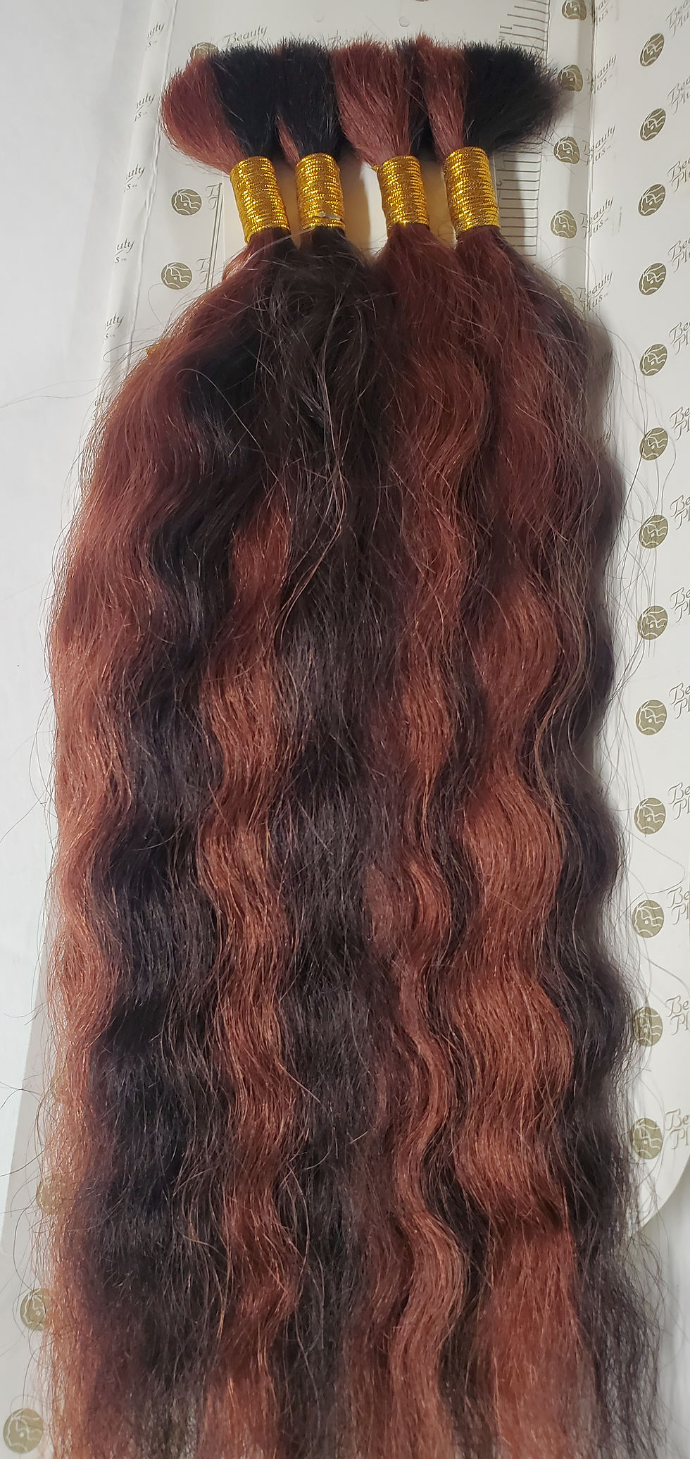 Thumbnail: Natural curly human hair weave, dark and auburn blend