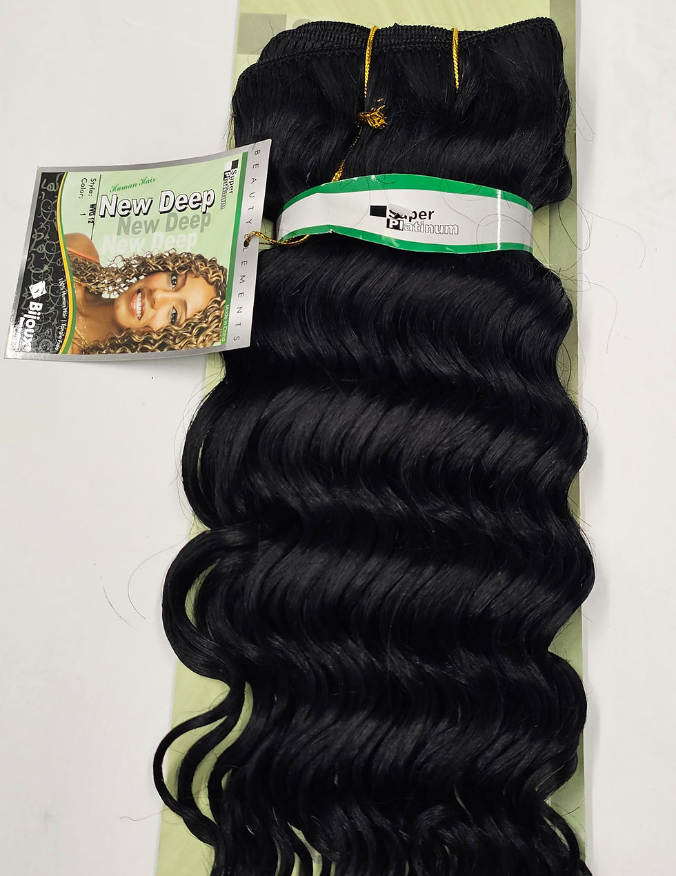 Thumbnail: Black wavy hair extensions with Fibre Wax