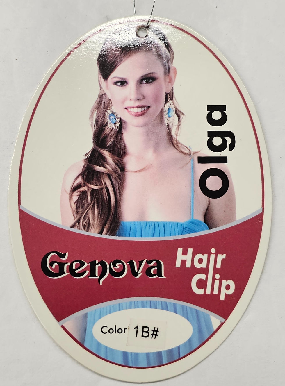 Thumbnail: Genova Hair Clip label: Olga with wavy brown hair, color 1Bg