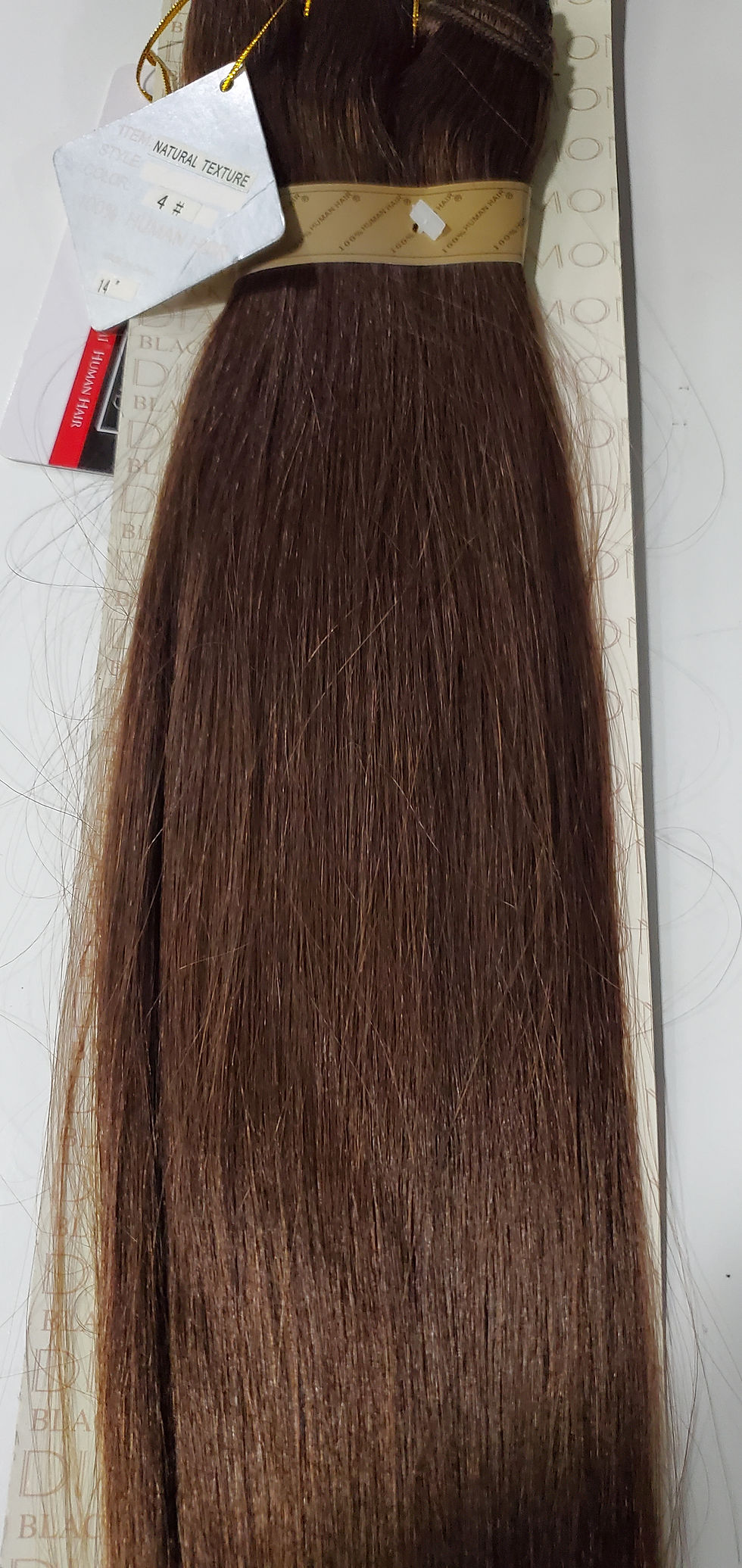Thumbnail: Bundle of long brown hair extensions