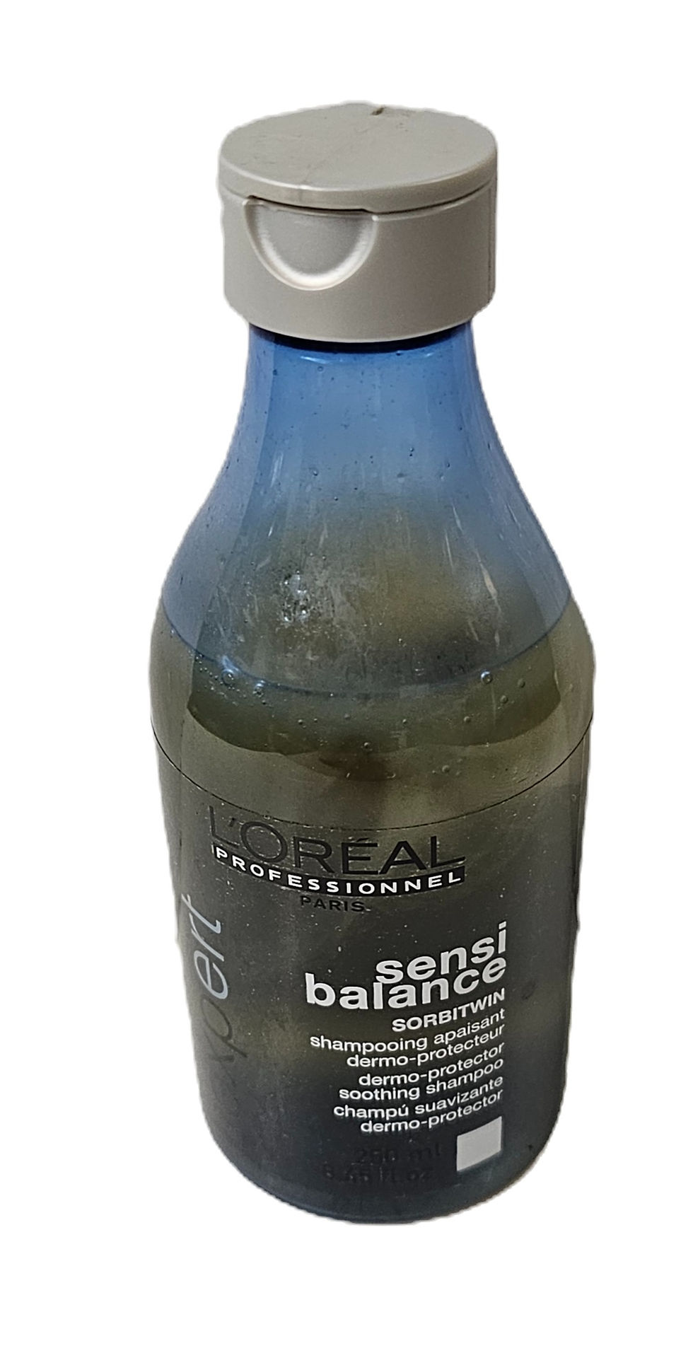 Thumbnail: Blue and dark hair product bottle with gray cap