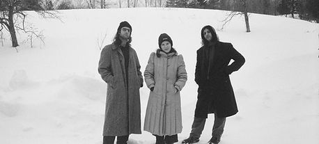 ruth-garbus-elie-mcafee-hahn-nick-bisceglia-trio_photo-kyle-thomas_serious-standing-full-body.jpg
